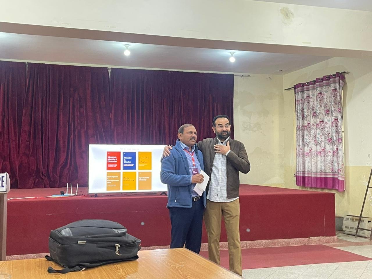 CCD leader honoring a participant at a church retreat